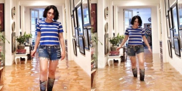 Kebanjiran, Yuni Shara Tetap Tampil Kece : Bersepatu Boots dan Celana Jeans Pendek